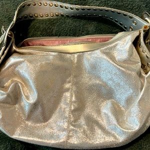 Silver metallic shoulder/hobo bag by Kathy Ireland. Gently Used.